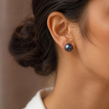 Load image into Gallery viewer, Black natural pearl stud earring worn on a model, crafted in 925 sterling silver