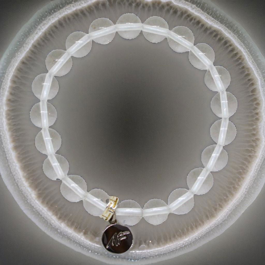 Clear Quartz Flat Silver Bead Bracelet (8 MM)