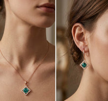Load image into Gallery viewer, Woman wearing Emerald Lumina crystal silver necklace set with green crystal pendant and matching drop earring