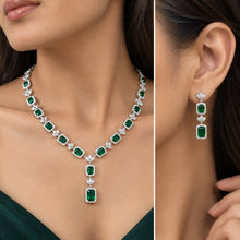 Load image into Gallery viewer, Emerald princess cut zircon silver necklace and earrings worn by a model