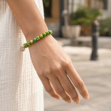Load image into Gallery viewer, Woman wearing Natural Olive Green Jasper Flat Silver Bead Bracelet 8MM by MysticFlavia with elegant casual style