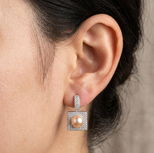Load image into Gallery viewer, MysticFlavia pink natural pearl paved zircon silver earring worn on a model ear