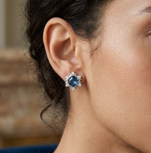 Load image into Gallery viewer, Woman wearing Princess Diana crystal stud silver earring, close-up on ear.