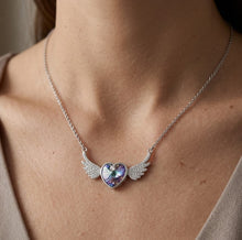 Load image into Gallery viewer, Woman wearing Purple Angel Wings crystal silver necklace with purple heart crystal pendant