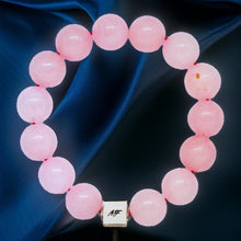 Load image into Gallery viewer, Rose quartz bracelet with blue abstract background and silver bead detail by MysticFlavia