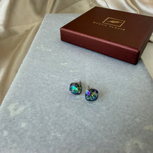 Load image into Gallery viewer, Swarovski crystal stud earrings placed near gift box, close-up on white background.