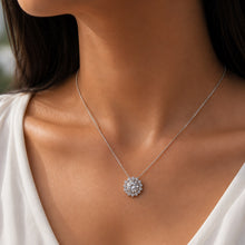 Load image into Gallery viewer, Woman wearing MysticFlavia moissanite princess necklace, close-up on neck, flower halo design.