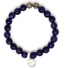 Load image into Gallery viewer, Amethyst bracelet with round purple beads and silver charm on a clean white background by MysticFlavia