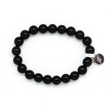 Load image into Gallery viewer, Black obsidian flat silver bead bracelet 8mm side view with 925 sterling silver brand charm on white background