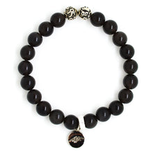 Load image into Gallery viewer, MysticFlavia black obsidian bracelet 8mm flat view with two engraved silver accent beads at top and dark round brand charm at bottom