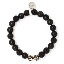 Load image into Gallery viewer, Black obsidian 925 sterling silver bead bracelet 8mm top view with engraved silver beads at bottom and round brand charm at top