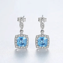 Load image into Gallery viewer, Milano Blue Topaz Zircon Dangling Silver Earrings