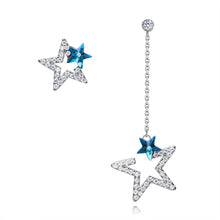 Load image into Gallery viewer, Dangling star crystal silver earrings, double star design with blue crystal accent, front view.