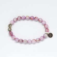 Load image into Gallery viewer, Kunzite bracelet flat lay showing carved silver beads and small round silver charm