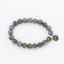 Load image into Gallery viewer, Top view of Labradorite Flat Silver Bead Bracelet 8mm showcasing natural blue flash labradorite gemstone beads with a 925 sterling silver flat bead by Mystic Flavia.