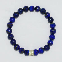 Load image into Gallery viewer, Lapis lazuli double flat silver bead bracelet 8mm top view with silver accent bead at bottom on white background