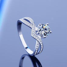 Load image into Gallery viewer, Moissanite silver ring featuring a brilliant center stone and sparkling crossover band, premium MysticFlavia jewellery