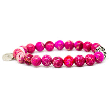 Load image into Gallery viewer, Side view of the Natural Pink Jasper Stone Silver Bead Bracelet 8MM showcasing polished pink jasper gemstone beads, decorative silver beads, and the signature MysticFlavia charm.