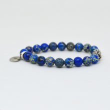 Load image into Gallery viewer, Side view of Navy Jasper Stone Silver Bead Bracelet 8MM with polished natural navy jasper gemstone beads and silver bead accents