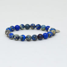 Load image into Gallery viewer, Angled view of Navy Jasper Stone Silver Bead Bracelet 8MM showcasing natural navy jasper beads and sterling silver bead design