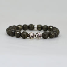Load image into Gallery viewer, Pyrite faceted bracelet close-up showing silver beads detail, side angle white background