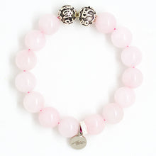 Load image into Gallery viewer, Rose quartz 12MM bead bracelet with silver charm displayed on a white background