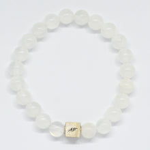 Load image into Gallery viewer, Natural selenite bracelet with 925 sterling silver square infinity bead tag, flat lay on white background
