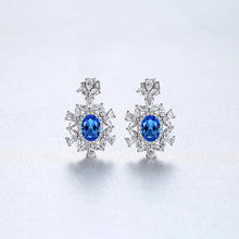 Load image into Gallery viewer, Snowflake Blue Topaz Dangling Silver Earrings