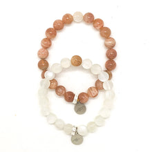 Load image into Gallery viewer, Sunstone and Moonstone Couple Bracelet 8MM with natural gemstone beads and sterling silver charm on white background
