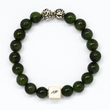 Load image into Gallery viewer, Jade bracelet side view showing 925 sterling silver charm engraved with MF logo