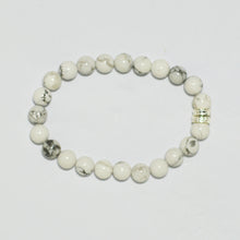 Load image into Gallery viewer, White howlite bracelet with 925 sterling silver beads, side angle view white background