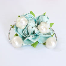 Load image into Gallery viewer, White pearl flower hoop earrings with blue floral background