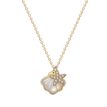 Load image into Gallery viewer, 18K gold-plated starfish pendant silver necklace with white pearl accent on a white background – MysticFlavia