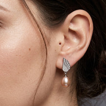 Load image into Gallery viewer, Angel wing natural pearl zircon silver earring worn on a model ear
