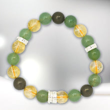 Load image into Gallery viewer, Top view of Aventurine Citrine Pyrite 8MM bracelet with silver spacer beads
