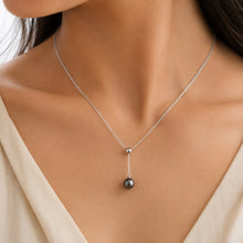 Load image into Gallery viewer, Black natural pearl silver necklace worn elegantly on a model | MysticFlavia
