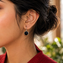 Load image into Gallery viewer, Model wearing black natural pearl drop earrings with silver hooks
