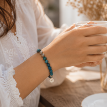 Load image into Gallery viewer, Blue Apatite Stone Silver Bead Bracelet 8mm worn on female wrist in natural light
