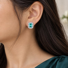 Load image into Gallery viewer, Green gemstone 925 sterling silver stud earrings with rectangular center stone and pavé halo
