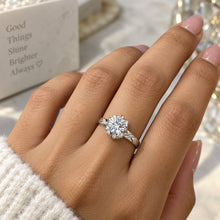 Load image into Gallery viewer, MysticFlavia moissanite ring worn on a woman's hand with a floral cluster center
