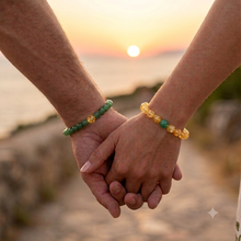 Load image into Gallery viewer, Couple wearing MysticFlavia Green Aventurine and Citrine bracelets while holding hands
