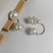 Load image into Gallery viewer, Natural pearl flower earrings styled with a wooden accent
