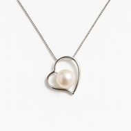 Silver heart pearl pendant necklace on white background