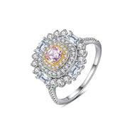 Pink gemstone 925 sterling silver paved ring with halo design on white background