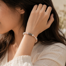 Load image into Gallery viewer, Woman wearing Pink Opal Stone Silver Bead Bracelet 8mm with 925 sterling silver beads in a lifestyle setting
