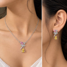 Load image into Gallery viewer, Pink and yellow gemstone necklace and earring set styled on a model
