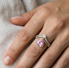 Load image into Gallery viewer, Pink heart gemstone silver ring worn on a finger, showcasing the two-tone detailed band
