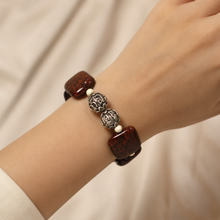 Load image into Gallery viewer, Female model wearing Poppy Jasper Square Silver Bead Bracelet 12 MM with natural gemstone and 925 sterling silver beads by Mystic Flavia
