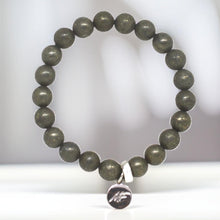 Load image into Gallery viewer, Natural pyrite flat bracelet with 925 sterling silver charm, grey shadow background
