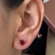 Load image into Gallery viewer, Red Heart Crystal Exquisite Silver Earrings worn on a woman’s ear MysticFlavia
